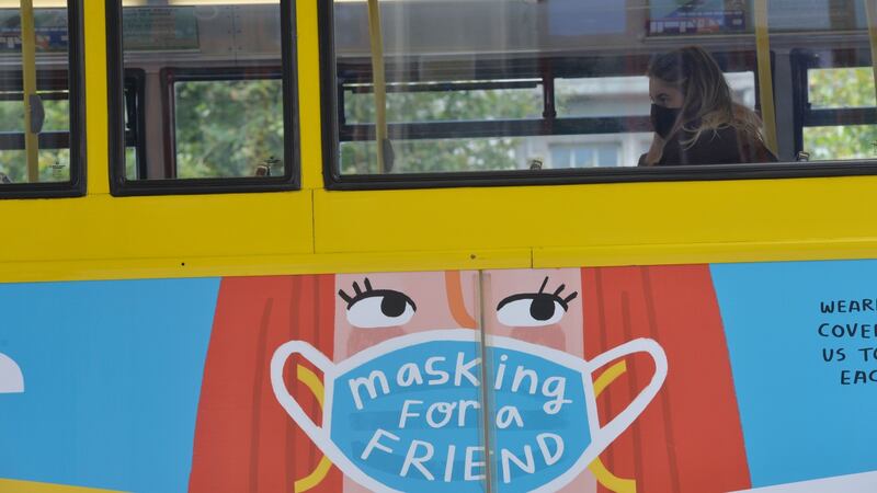 A passenger wears a mask on a bus in Dublin city centre. Photograph: Alan Betson