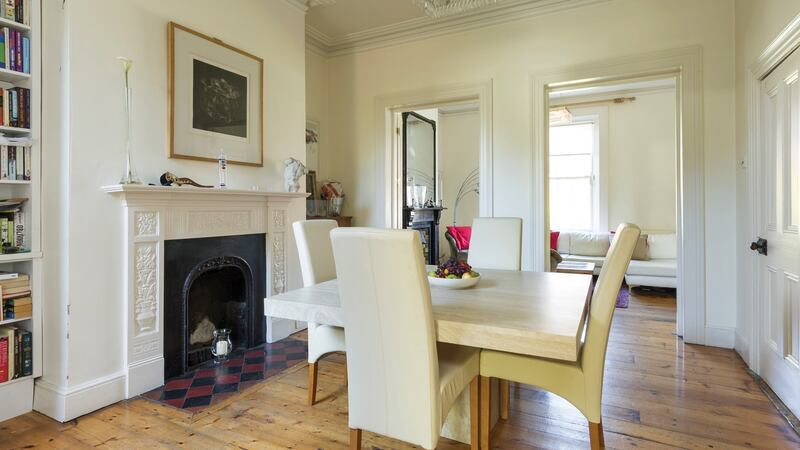 Polished wooden floorboards are a feature that runs throughout the reception rooms