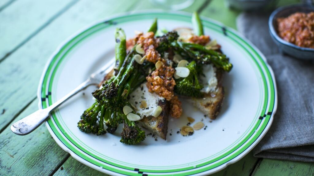 Charred broccolini with smoky romesco sauce and toasted almonds: serve it while the broccolini is still warm.