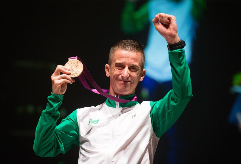 Rob Heffernan with his 2012 London Olympic men's 50km race walk bronze medal at City Hall, Cork, in November 2016. Photograph: Cathal Noonan/Inpho
