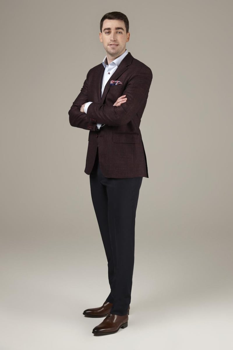 David Alford wears wine blazer €549, LC Heritage, navy trousers €295 Canali, blue shirt with contrast buttons €139 Stenstroms, brown shoes €279 Mack James, pocket square €29, brown belt €69, both Louis Copeland.