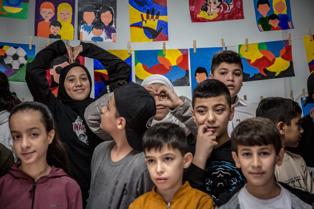 Children celebrate Children's Day at a centre run by Mouvement Social in Beirut. Photograph: Sally Hayden