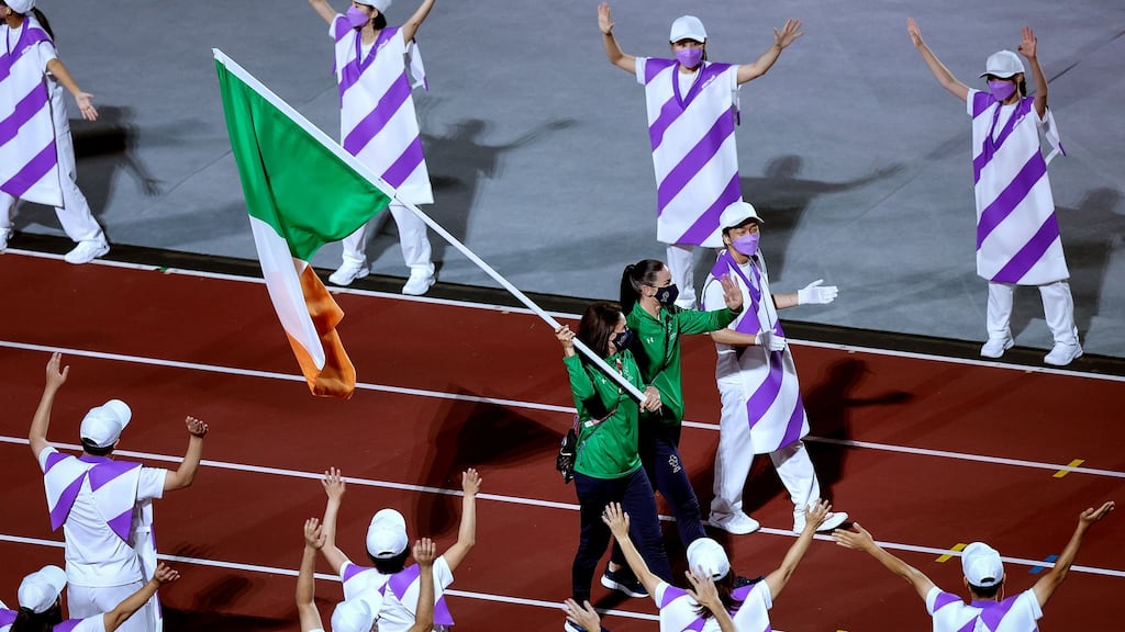 Team Ireland’s Katie George Dunlevy and Eve McCrystal carry the Irish Tricolour at the closing ceremony of the 2020 Tokyo Paralympic Games. Photograph: Tommy Dickson/Inpho