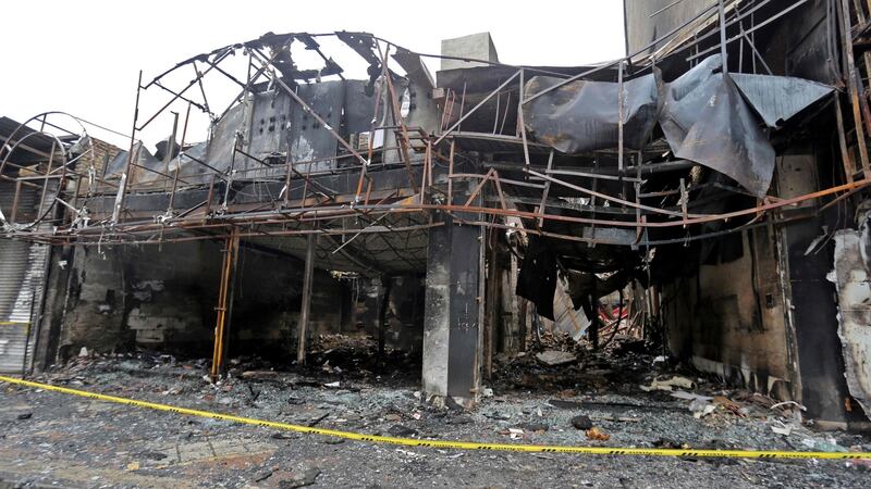 Shops destroyed during demonstrations against petrol price hikes in Shahriar, west of Tehran. Photograph: Atta Kenare/AFP via Getty Images