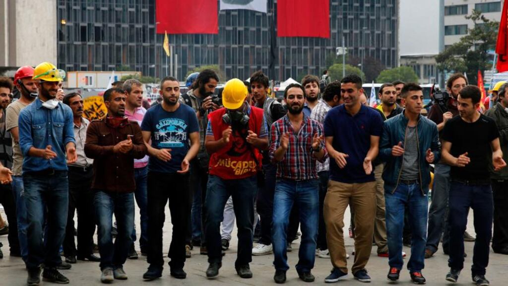 Protesters dance in Gezi park in Istanbul’s Taksim square early this morning despite being ordered yesterday by Turkey’s ruling AK Party to leave immediately. Photograph: Yannis Behrakis/Reuters
