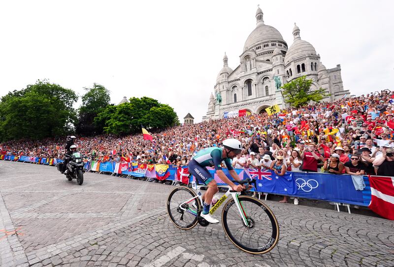 Ireland's Ben Healy passes the Basilique du Sacre Coeur de Montmartre during the men's cycling road race in Paris. Photograph: David Davies/PA Wire