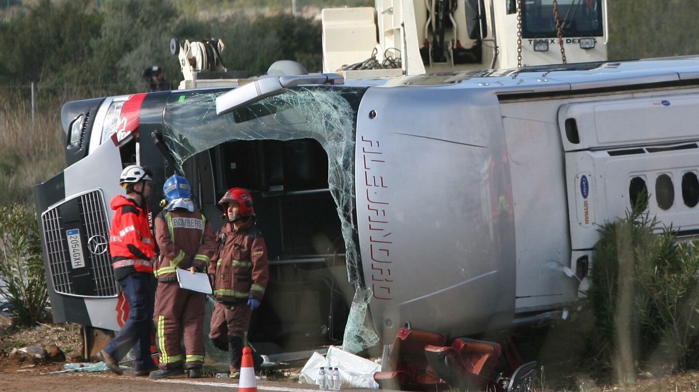 Emergency services’ members at the site of the coach crash. Photograph: EPA