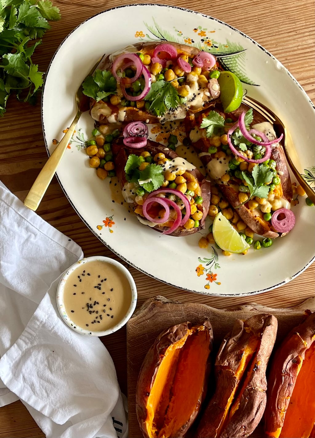 Baked sweet potato with tahini sauce