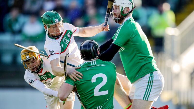 Rathdowney-Errill’s Brandon McGinley and Ross King compete for possession with John Doran and Paul Doyle of St Mullins during the AIB Leinster club hurling semi-final at Netwatch Cullen Park. Photograph: Bryan Keane/Inpho