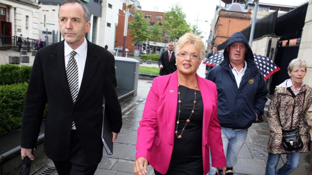 Democratic Unionist councillor Ruth Patterson, with her solicitor Denis Moloney, arriving at Belfast Magistrates Court today in connection with a comment she posted on Facebook. Photograph: Paul Faith/PA Wire