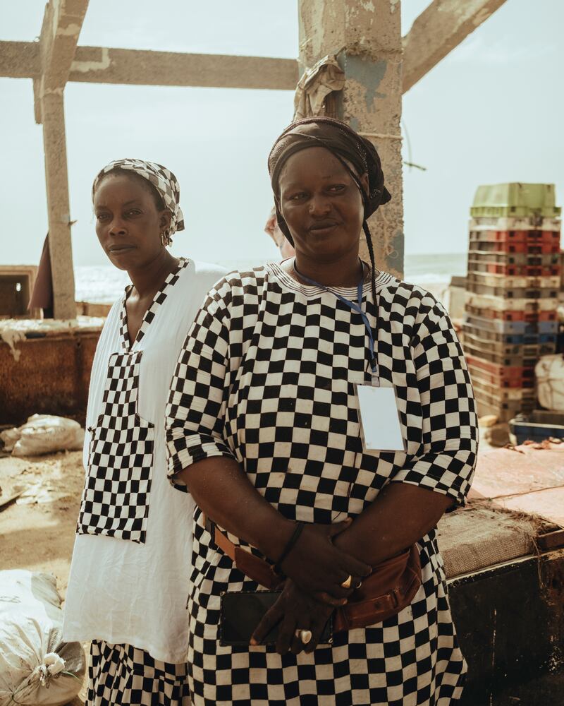 Yaye Maisa Dieye lost her home during a storm. She now works at the fish market on the Langue the Barbarie while her husband has to go for months long fishing trips in Mauritania, because of the lack of fish on the local coast. Photograph: Sirio Magnabosco
