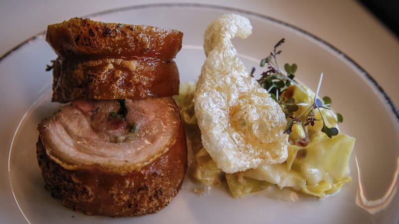 Suckling pig belly with cider pickled hispy cabbage and bacon creme fraiche.