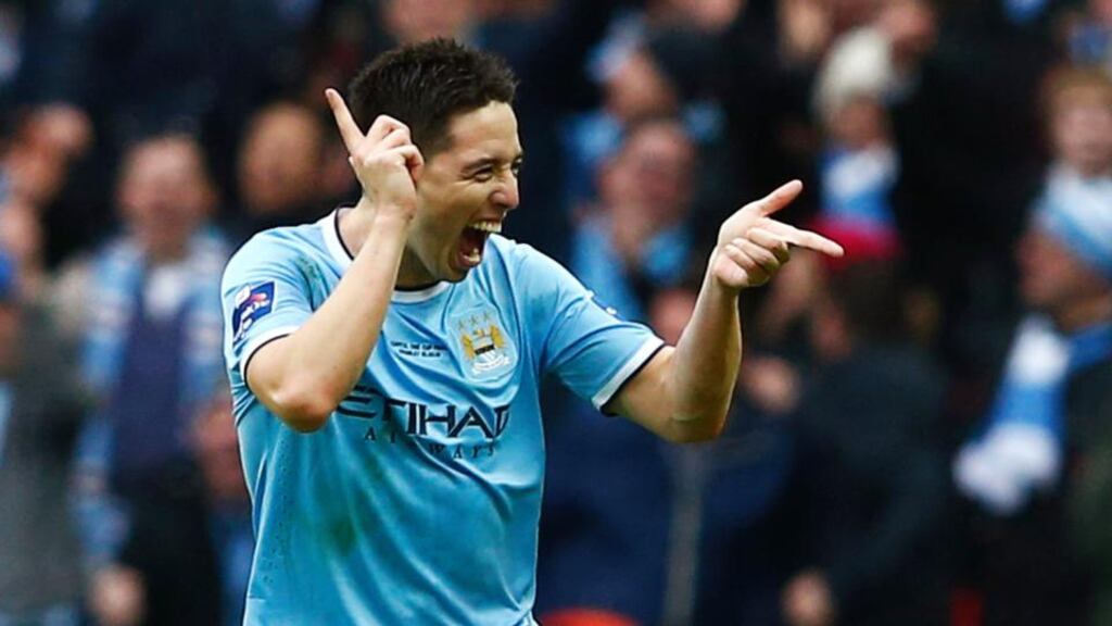 Manchester City’s Samir Nasri celebrates after scoring the second against Sunderland in the English League Cup final . Photograph: Eddie Keogh/Reuters