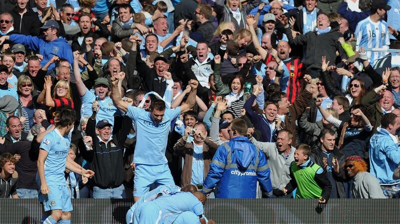 Sergio Aguero celebrates after winning the Premier League for Manchester City in 2012. Photo: Paul Ellis/AFP/GettyImages