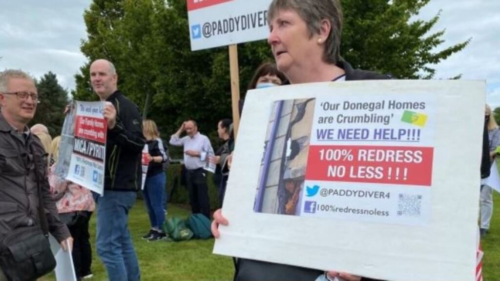 Protesters from Donegal at the recent Fianna Fáil think-in in Cavan, calling for 100% redress for affected mica homeowners. Photograph: Dominic McGrath/PA Wire