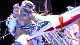 Olympic torch goes walkabout in space