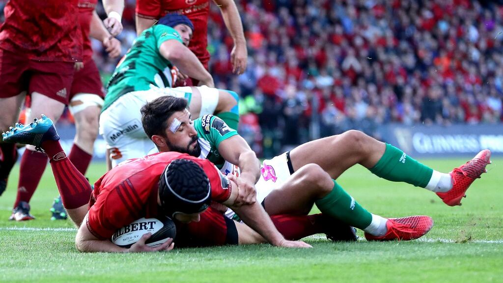 Captain Tyler Bleyendaal crosses for Munster in the opening half. Photograph: Bryan Keane/Inpho