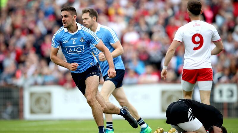 James McCarthy celebrates scoring Dublin’s goal against Tyrone at Healy Park in the Super 8s clash. Photograph: Ryan Byrne/Inpho