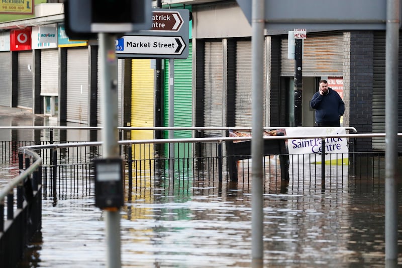 Flooded shops in Downpatrick town centre on Saturday. Photograph: Peter Morrison/PA Wire