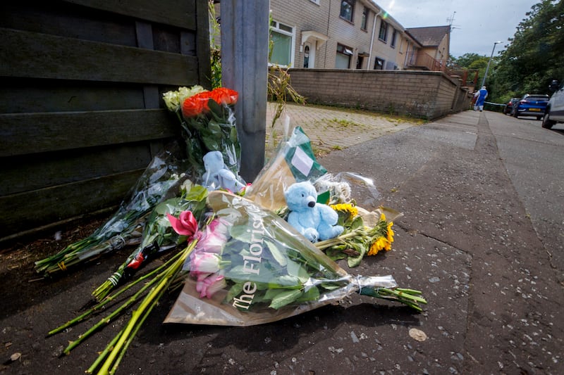 Floral tributes and teddy bears placed in Elmfield Walk area of Donaghadee, Co Down, after a murder investigation was launched in connection with the death of Sarah Montgomery. Photograph: Liam McBurney/PA