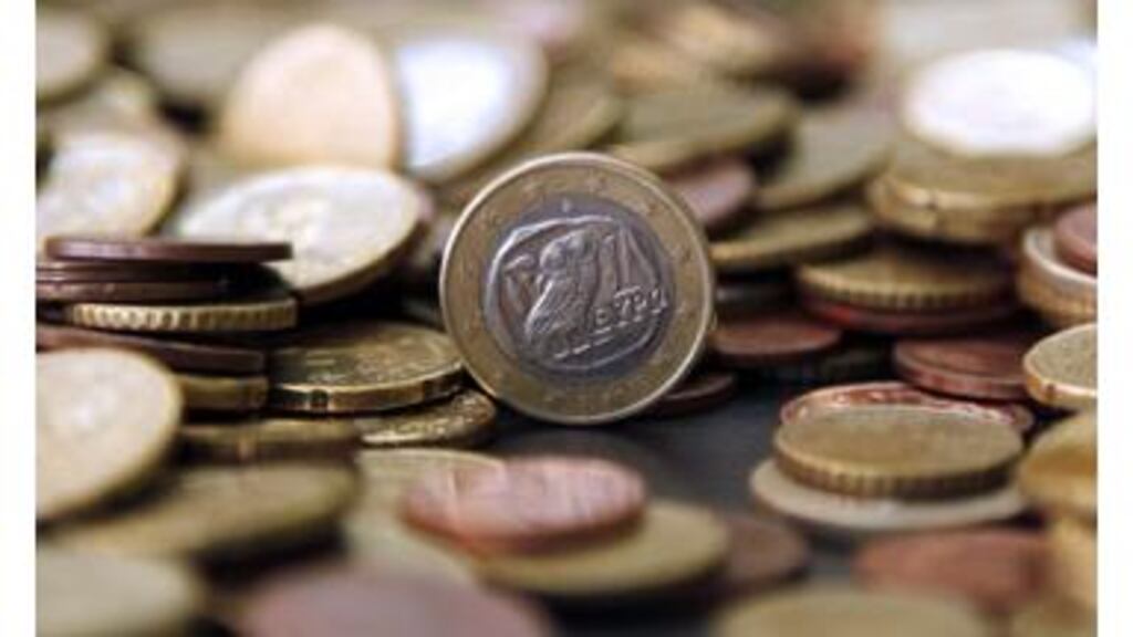 European shares ease as focus shifts to economic outlook.