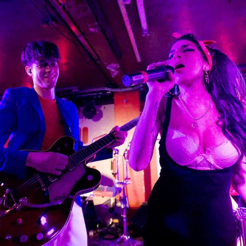 ‘It was an instant familiarity’:  Amy Winehouse performs   with Mark Ronson in London, 2010. Photograph:  Samir Hussein/Getty