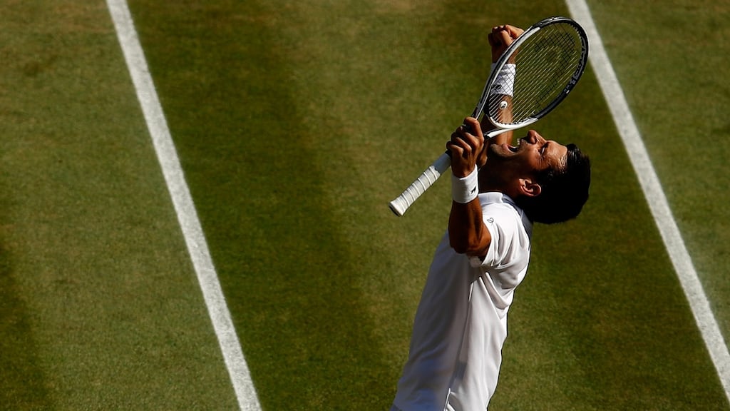 Novak Djokovic celebrates his victory over Kevin Anderson in the men’s singles final at Wimbledon. Photograph: Julian Finney/Getty Images