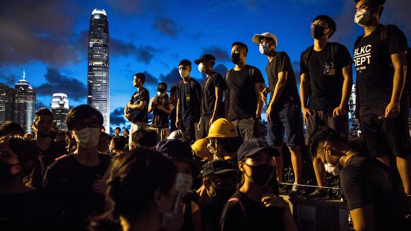 Protesters gather outside the government headquarters in Hong Kong. Photograph: Dale De La Rey/AFP/Getty Images
