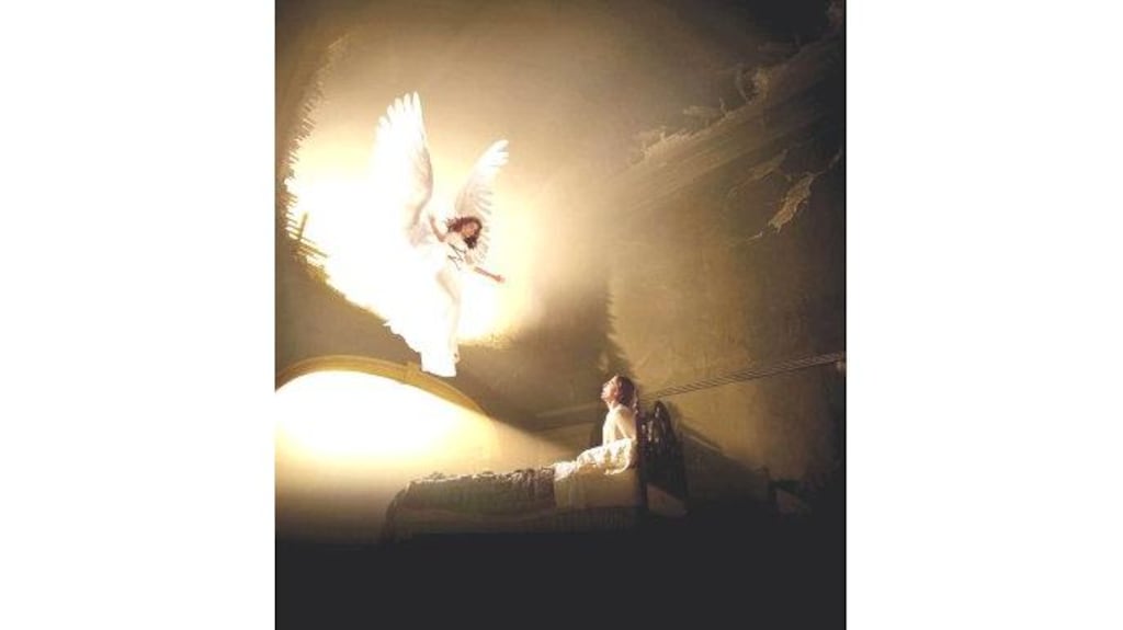 Emma Thompson, as an angel, appears to Al Pacino (heartless Republican lawyer Roy Cohn, who is dying of AIDS).