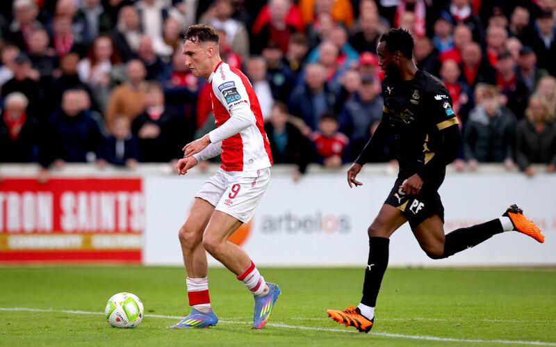 Mason Melia on his way to scoring his St Pat's second goal. Photograph: Ryan Byrne/INpho