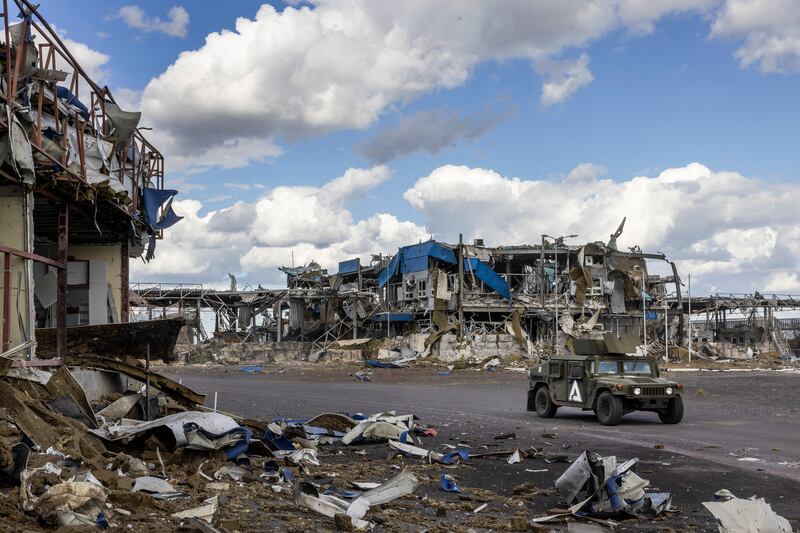 A Ukrainian Humvee passes through a destroyed Russian border post at the Sudzha border crossing with Ukraine on Monday, August 12th, 2024. Photograph: David Guttenfelder/The New York Times