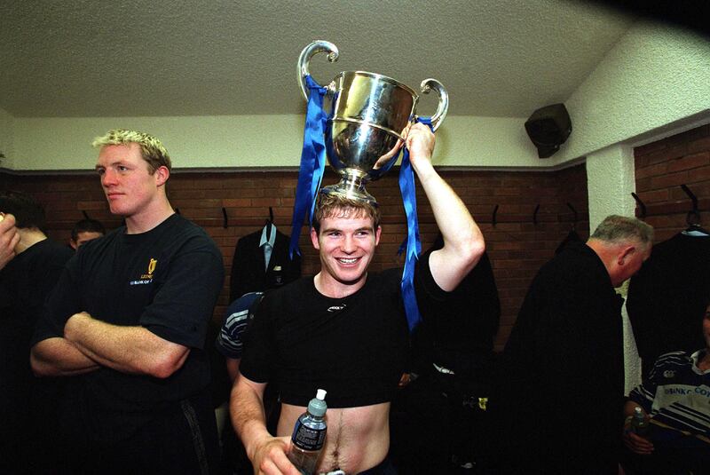 Gordon D'Arcy of Leinster celebrates with the Celtic League cup on December 15th, 2001. Photograph: Billy Stickland/Inpho