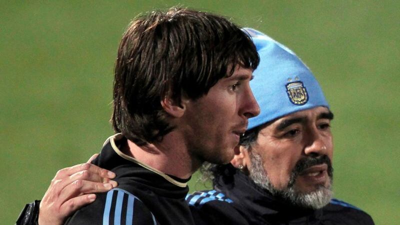 Argentina’s then coach Diego Maradona (right) walks alongside Lionel Messi after a practice soccer session in Pretoria in 2010. Photograph: Reuters/Enrique Marcarian