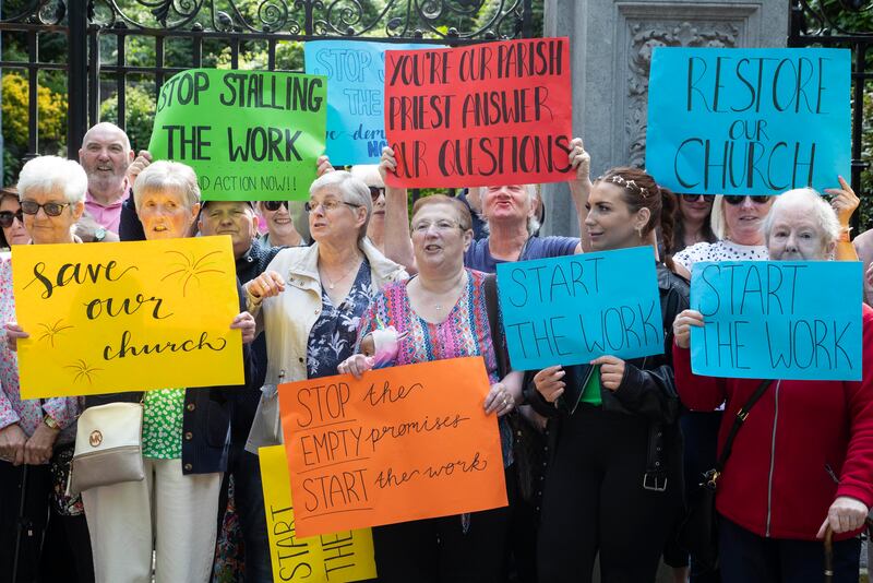 Protesters outside the Archbishop's Palace in Drumcondra call for funds to be directed into the renovation of the Immaculate Heart of Mary Church on City Quay. Photograph: Colin Keegan, Collins Dublin