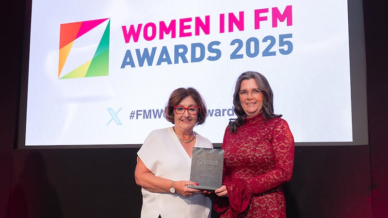 Eileen Slamon, awards judging coordinator, presents the mentor of the year award to Monique Campher, OCS Ireland