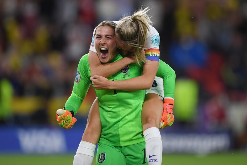 England goalkeeper Mary Earps celebrates with Leah Williamson after Alessia Russo scored England's third goal against Sweden. Photograph: Harriet Lander/Getty Images