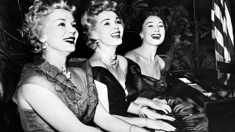 Zsa Zsa Gabor (centre) and her sisters Eva (left) and Magda in 1954. Photograph: Getty Images