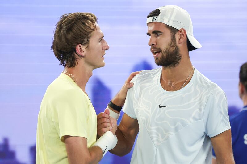 Sebastian Korda of the US and Karen Khachanov of Russia chat at the end of their quarter-final match at the Australian Open. Photograph: Fazry Ismail/Shutterstock/EPA
