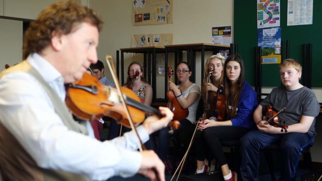 Students participate in the fiddle class with Frankie Gavin at Fleadh Cheoil na hÉireann. Photograph: Lorcan Doherty Photography