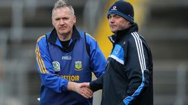 Eamon O’Shea left smiling as Anthony Daly acknowledges the gap