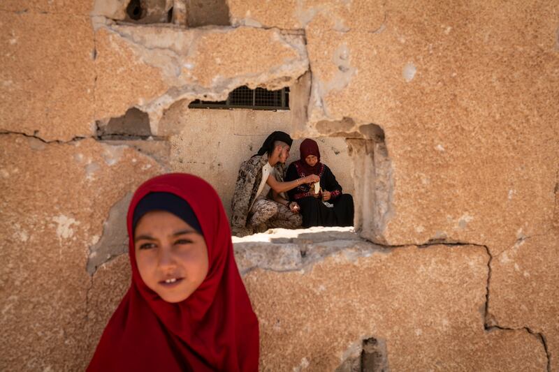 Bedouins from Sweida wait to register for assistance at a school in Buser al-Harir, Syria, last month. Photograph: Nicole Tung/The New York Times