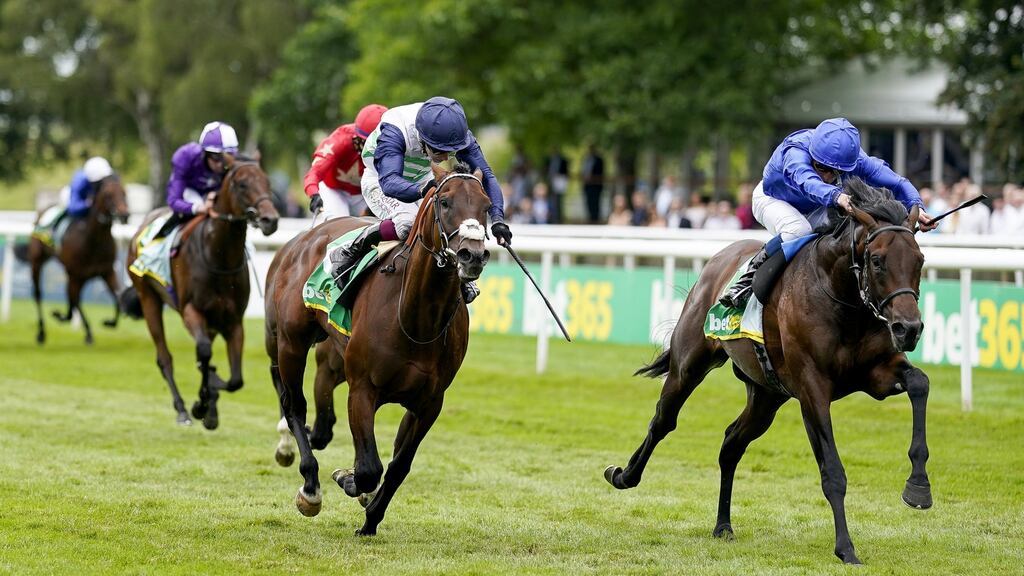 William Buick aboard Native Trail (right, in Godolphin blue livery) wins the bet365 Superlative Stakes at Newmarket last July. File photograph: Getty