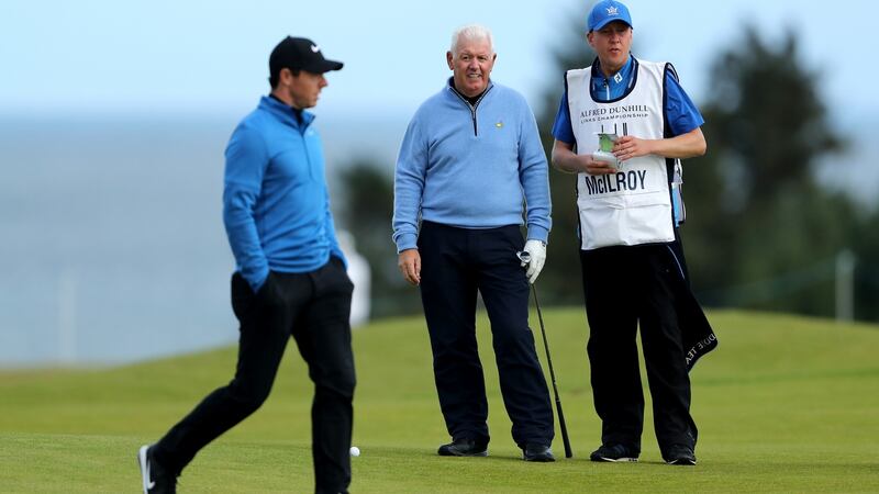 McIlroy with father Gerry on the ninth hole at Kingsbarns. Photo: David Cannon/Getty Images