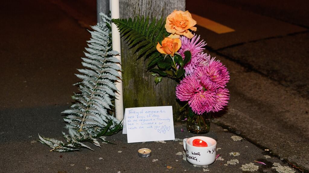 A floral tribute left on Linwood Avenue near the Linwood Masjid in Christchurch, New Zealand. Photograph: Kai Schwoerer/Getty Images