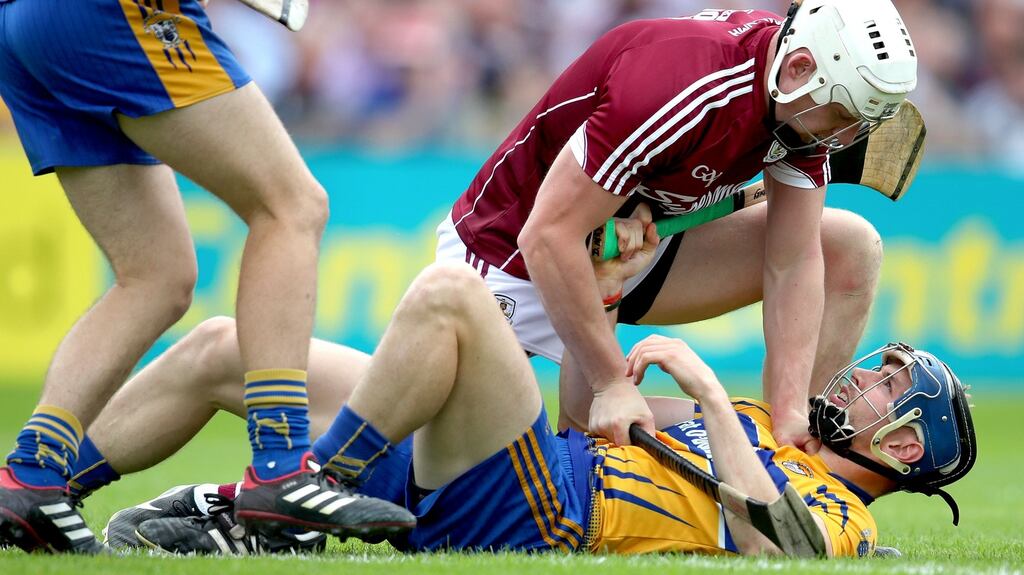 Tempers flare between Clare’s David McInerney and Joe Canning of Galway. Photograph: Bryan Keane/Inpho