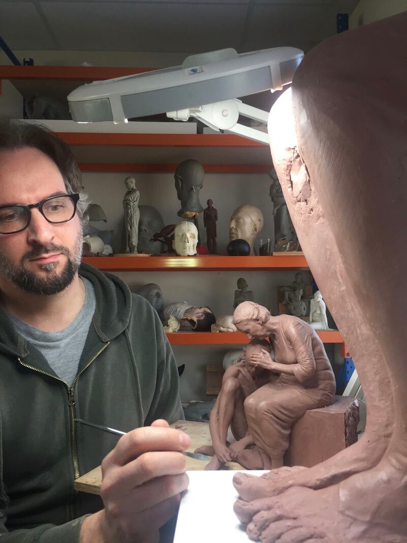 Sam Jinks at work on one his pieces.