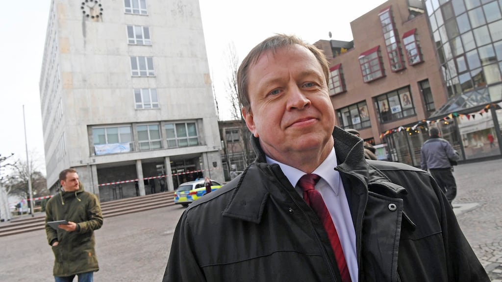 Gaggenau’s mayor Michael Pfeiffer outside the  city hall,  cordoned off by police following a bomb threat, a day after the mayor blocked a rally by Turkey’s justice minister. Photograph:  Uli Deck/Getty Images