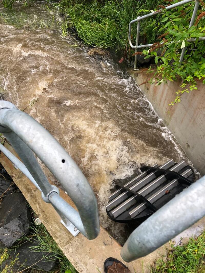 Water overspill leading into the Tolka river in Blanchardstown. Photograph: John Whittle