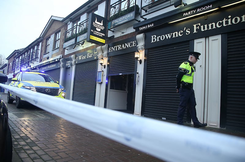 Gardaí pictured outside Browne's Steakhouse in Blanchardstown Jason Hennessy snr (48) was shot on Christmas Eve. Photograph: Stephen Collins/Collins Photos