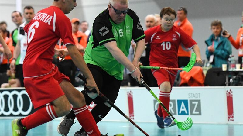 1Team Ireland’s Patrick Tunstead, a member of Estuary Centre Special Olympics Club, from Julianstwon, Co Meath, in action against Michael Moik, Austria. Photograph: Ray McManus/Sportsfile